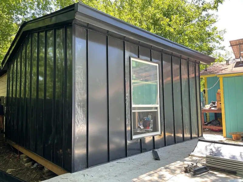 Black standing seam metal wall panels for Metal Roof Installation in Magnolia